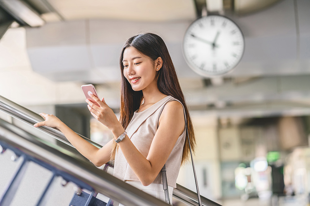 woman using phone app community connect